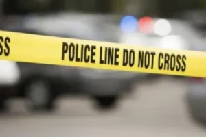 Police line tape blocking off the scene of a fatal motorcycle accident in Louisiana